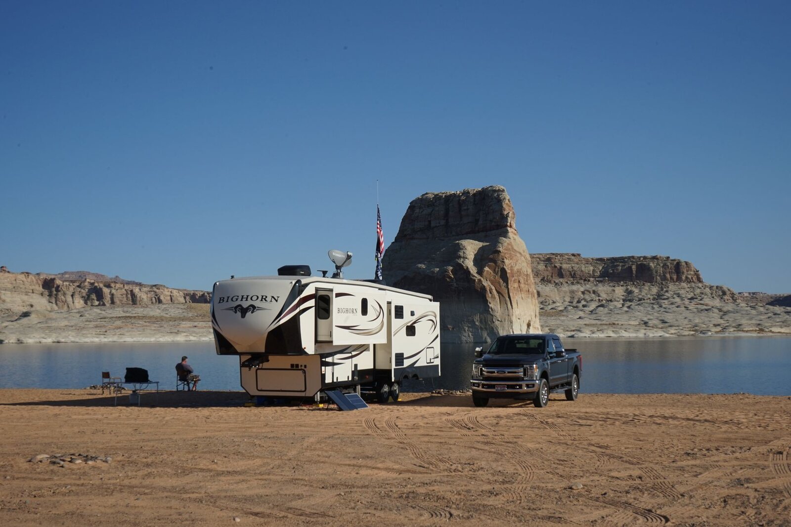 Campsite near water at dusk