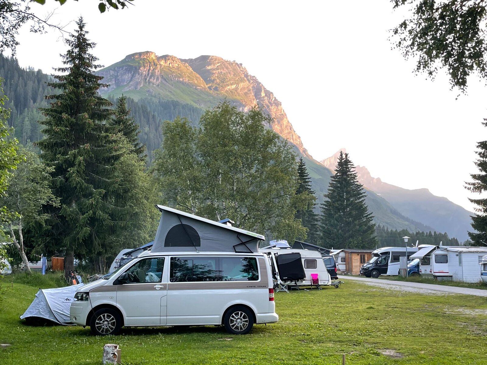 Camper van at an outdoor campsite